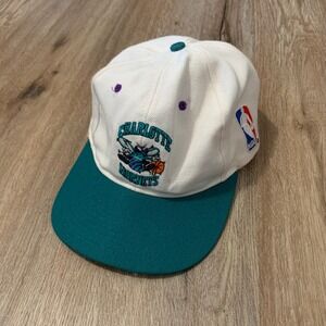 Vintage 1990s NBA Charlotte Hornets snapback hat in white teal